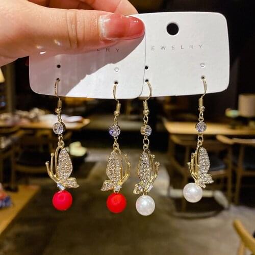 Temperamental Exquisite Full Rhinestone Personality Butterfly Earrings Elegant Fashion Simulated-pearl Light Luxury Eardrop