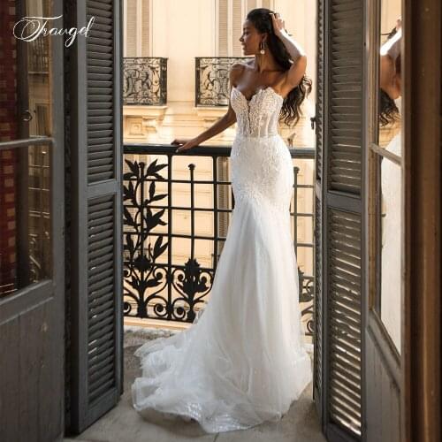 Traugel Sexy Illusion Sweetheart Lace Mermaid Wedding Dresses Shiny Sequins Appliques Court Train Trumpet Bridal Gown Plus Size