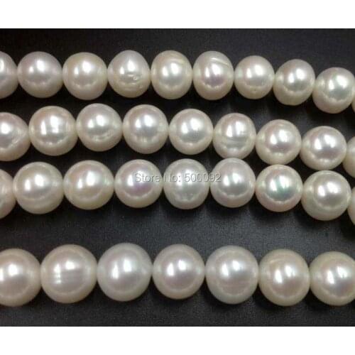 Wholesale 10mm near round white cultured freshwater pearl strands