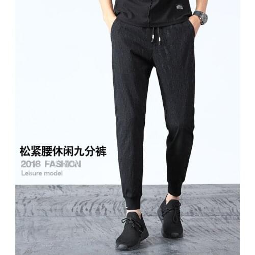 2021 Mens Casual Pants Loose Sports Feet Pants Sweatpants Long Pants Mens Harem Pants Binding Foot Trend