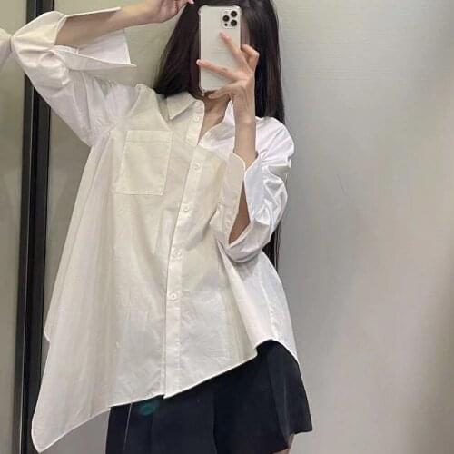 JUNWU Autumn Womens White Lapel Single-breasted Loose Asymmetrical Shirt Long Sleeve Chic Pocket Design Top Za Minimalist Style
