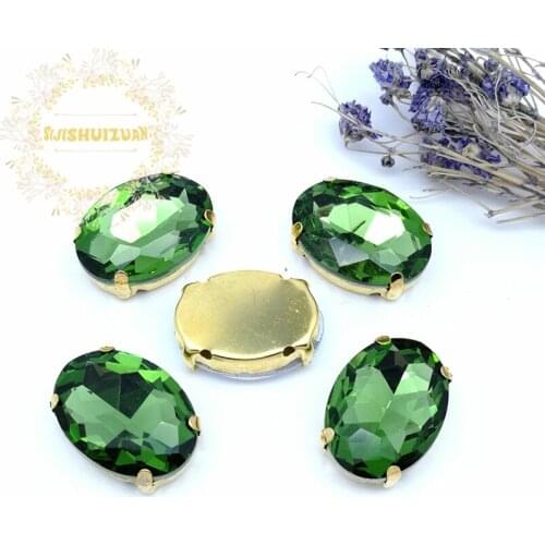 Free shipping!Emerald Crystal Glass Sew-on OVAL Rhinestones with gold Claw DIY wedding Dresses and Clothes