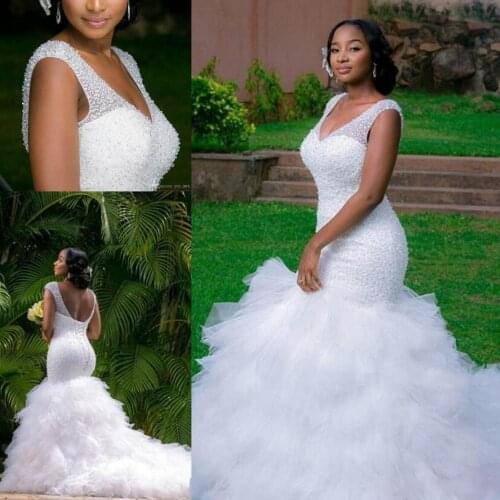 2021 African Cheap Mermaid Wedding Dresses Plus Size V Neck Cap Sleeves Crystal Beaded Sparkle Court Train Bridal Gowns Ruffles