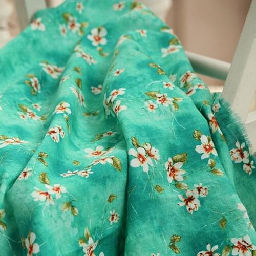 High quality flax cotton tissu White flowers and green background fabric DIY handmade shirt dress material