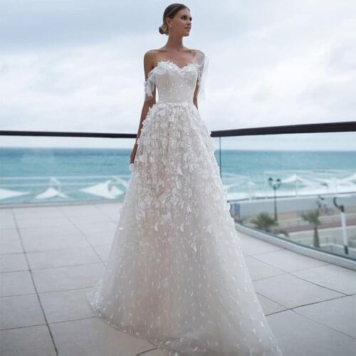 Sparkly Tulle A-Line Wedding Dresses Sexy Sweetheart Backless Off Shoulder Flowers Appliqued 2021 New Floor Length Bridal Gowns