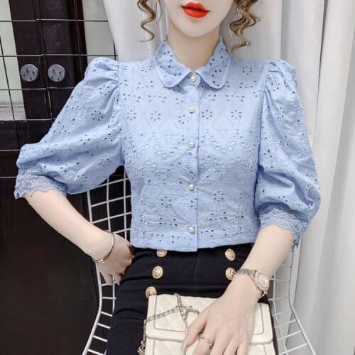 French hollow puff sleeve blue shirt womens summer 2021 new design sense of slim short-sleeved top