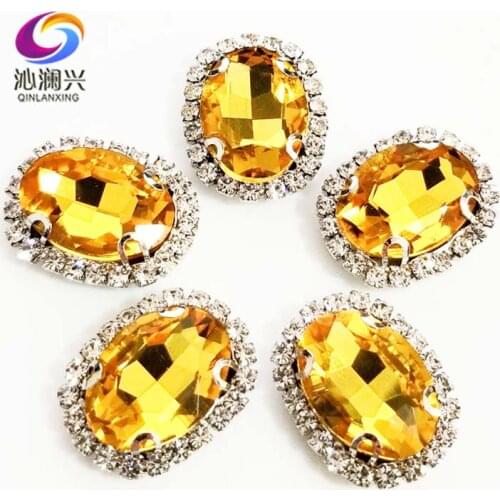 Golden yellow oval shape top quality sew on Glass Crystal buckle,silver bottom rhinestones,Diy/Clothing/wedding decoration