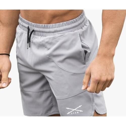 Mens summer quick-drying printed shorts running jogging sports five-point pants male professional fitness training shorts
