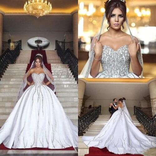 Nigerian Dubai Arabic Ball Gown Bling Beading Sequins Wedding Dresses Plus Size Sweetheart Backless Sweep Train Bridal gowns