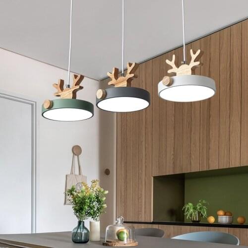 Nordic fashion restaurant LED chandelier office chandelier living room bedroom lighting creative solid wood deer head chandelier