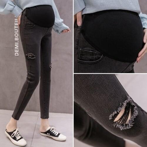 Pregnant womens jeans spring and autumn models wear nine-point fashion ripped Korean version of pregnant womens feet pants