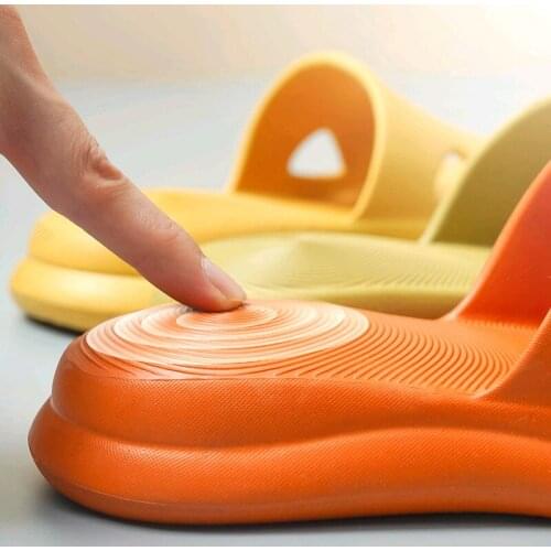 Stepping on the feel home slippers women summer bathroom bath non-slip EVA massage home indoor thick-bottomed couple cool drag