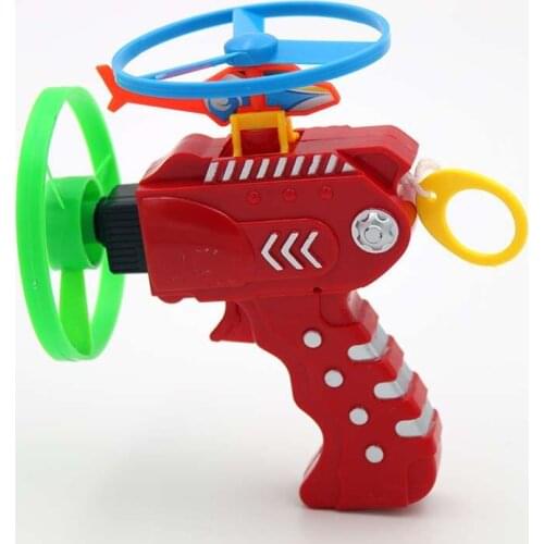 Plastic flying saucer toys toy Gyro Skeleton Flying Skeletal Pistol Pans Ufo Dragonfly Children Toy Gun outdoors sports Kids