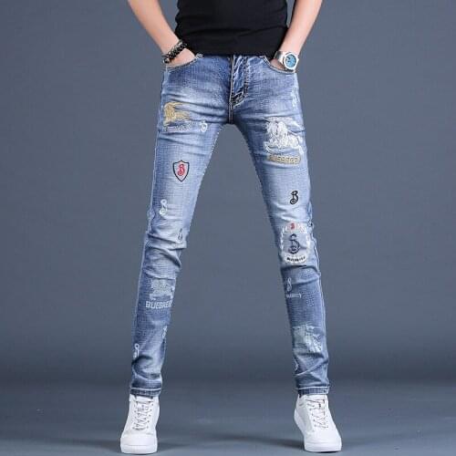 Summer embroidery jeans mens thin printed light-colored brand elastic feet all-match hole thin casual teenager pencil trousers