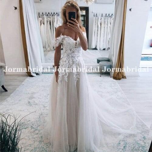 Romantic Floral Appliques Wedding Dresses Off Shoulder Flowing Tulle Light Champagne Wedding Formal Bridal Gowns Robe De Mariage