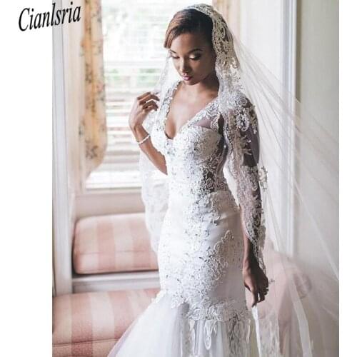 African Mermaid Wedding Dresses Deep V Neck Lace Applique Chapel Train Beaded Crystals Wedding Dress Bridal Gowns vestidos