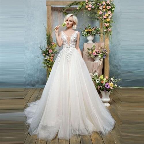 Amazing See Through Back Long A Line Wedding Dresses Lace Appliques Buttons Back Soft Tulle Sleeveless Bridal Gowns 2020 Spring