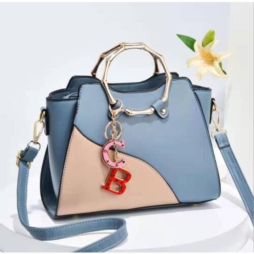 2021 New Metal Handle Womens Bags European American Fashion Ring Hit Color Womens Handbag High-End Shoulder Messenger Bag sac