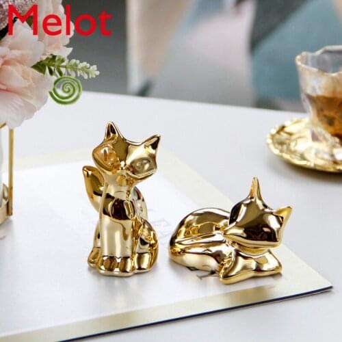 Simple and lovely gold ceramic home decoration ornaments abstract mini fox crafts desktop decorations