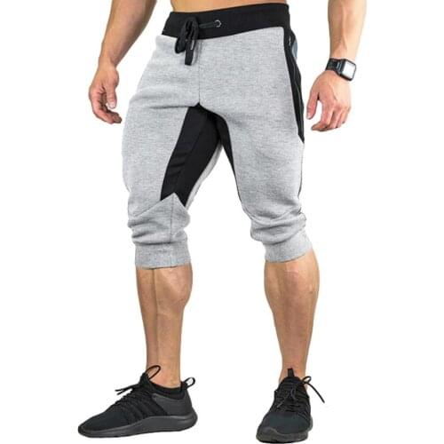 Men Casual Color Block Pockets Drawstring Capris Trousers Loose Sports Shorts
