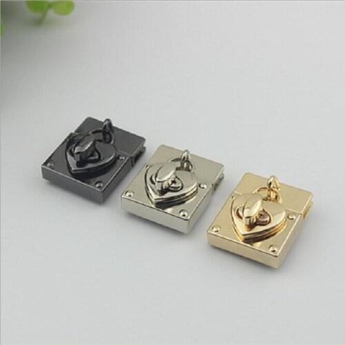 10 pieces / lot) New luggage metal accessories love pendant repair turn lock DIY handbag hardware
