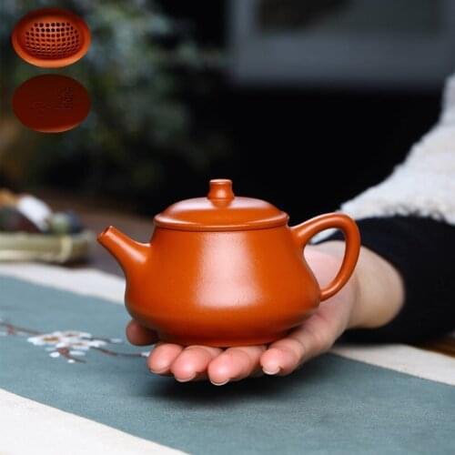 Clay teapot factory direct sales] vermilion clay ball hole inner wall seal exquisite handmade teapot kungfu tea set