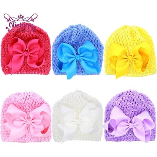 Nishine 15*14 CM Solid Color Handmade Knitted Baby Girls Hats Grosgrain Ribbon Bowknot Beanie Caps Newborn Hollowed Bonnet