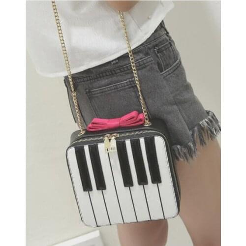 1 piece women bow black and white keyboard Patchwork shoulder bag handbag unique Piano messenger bag with gold chain
