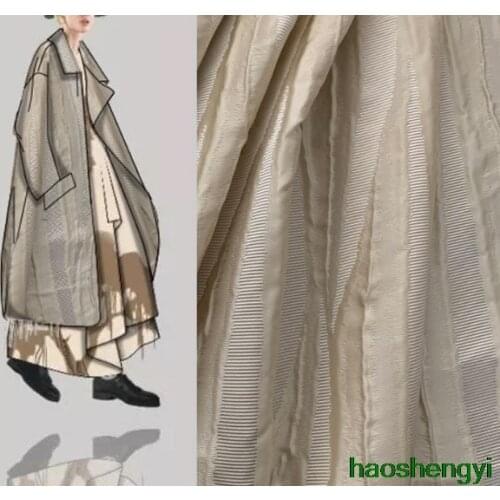 High-quality heavy industry irregular apricot bark stripes three-dimensional jacquard texture fashion fabric / half price