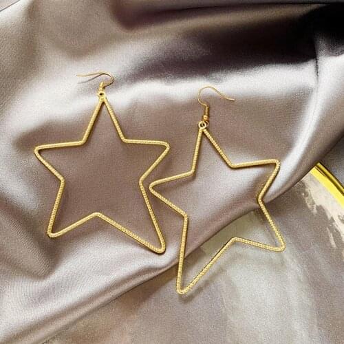 Fashionable temperament hollow metal five-pointed star big earrings exaggerated irregular ear hook gift