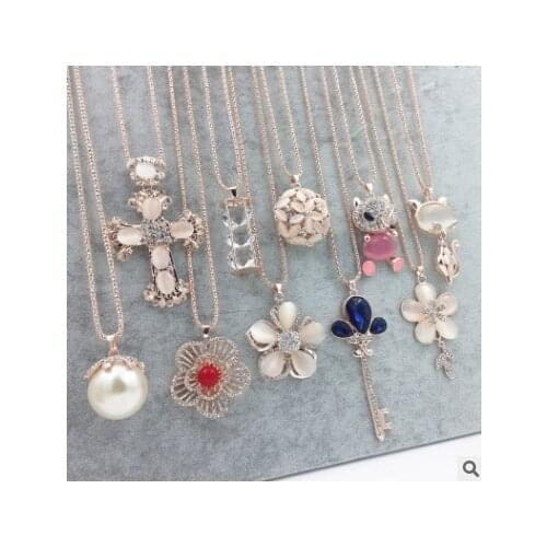 Korean version of rhinestone Joker clothing accessories ladies long necklace pendant personality Opal sweater chain wholesale