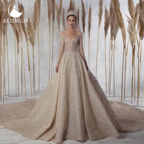 Aedmgh A-Line Luxury Wedding Dresses 2021 O-Neck Sweetheart Long Sleeve Bride Dress Lace Shiny Sequined Backless Bridal Gown