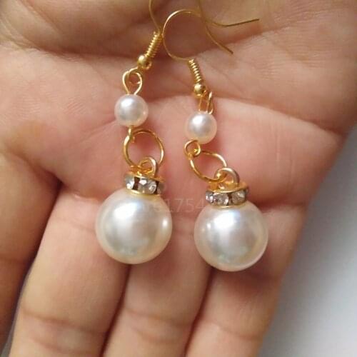 New Shiny Imitation Pearl Drop Earrings Of White серьги Women Gold Hang Dancing Drop Earrings Jewelry Personality Party Gifts