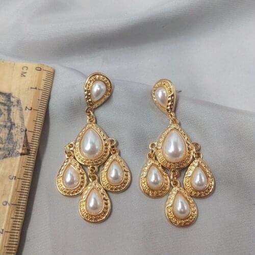 Qingdao jewelry earrings temperament fashion show model plating real gold exaggerated pearl silver pin Earrings d91