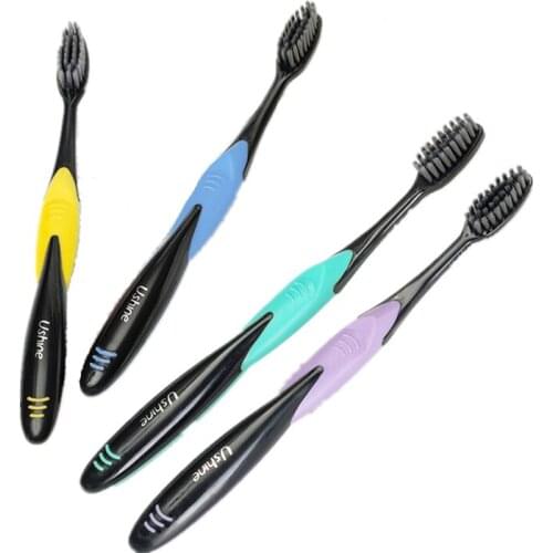 Top sale 4pcs Bamboo Charcoal Adult Toothbrush with Soft Bristles of family pack for Daily Dental Care keep oral cavity healthy