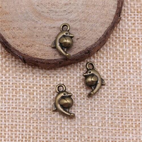 Free shipping 54pcs 15x9x5mm antique bronze dolphin charms diy retro jewelry fit Earring keychain hair card pendant accessories