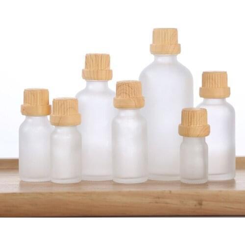 800pcs 5-100ml Empty Frosted Bottle essential oil Glass Aromatherapy Liquid Wood Grain Cap For Massage Pipette Refillable Bottle