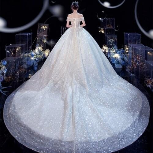 One-word Shoulder French Main Light Wedding Dress 2021 New Tug-of-tail Star Bride Super Fairy Temperament Sen System Dream