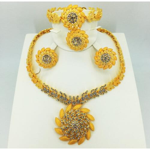 Diverse selection of stylish wedding Dubai African Jewelry collection gold necklace earrings romantic woman bride jewelry