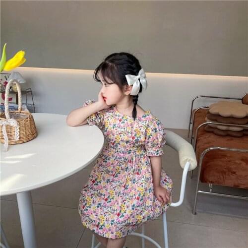 Childrens clothing new girls summer back hollow open waist buttoned short-sleeved floral dress princess dress