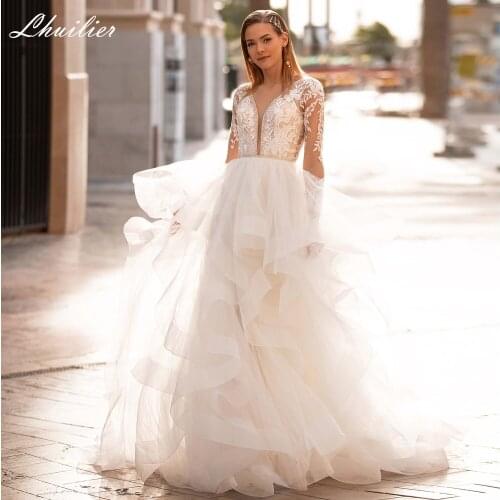 Lhuilier A-line V Neck Beaded Wedding Dresses 2020 Lace Appliques Long Sleeves Floor Length Backless Bridal Dress with Ruffles