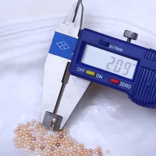 Daking Loose pearl 1.8-2.2mm rice shape freshwater pearl bead natural color real cultured freshwater pearl manufacturer