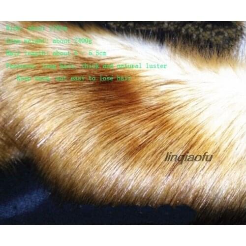 This white dyed yellow tip fox fur plush fabric