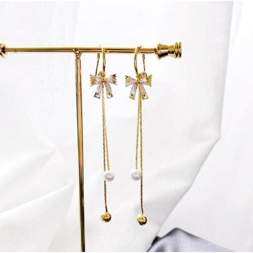 Korean Girl Earrings 2021 Fashion New Temperament Earrings Personality Net Red Bow Pearl Crystal Tassel Long Earrings Sale