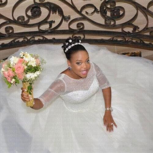 2019 New African Sheer Beads Ball Gown Wedding Dress Sexy Illusion Half Long Sleeve Arabic Bridal Gown Vestido De Noiva