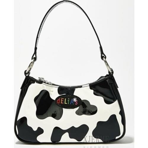 Female bag new 2020 one-shoulder handbag personality simple shiny cow bag baguette armpit bag purses and handbags