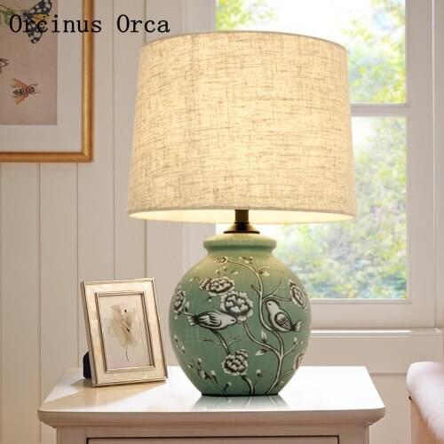 High-end custom-made American village painted ceramic desk lamp bedside lamp creative green flower and bird cloth art desk lamp