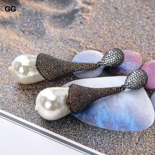 GuaiGuai Jewelry 16x25MM White Sea Shell Pearl Champagne CZ Pave Gunmetal Stud Earrings