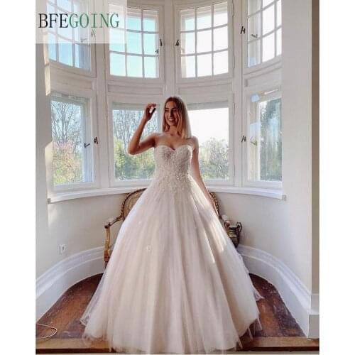 Tulle Lace Beading Sweetheart Floor-Length Princess A-Line Wedding Dresses Chapel Train Strapless Bridal Gowns