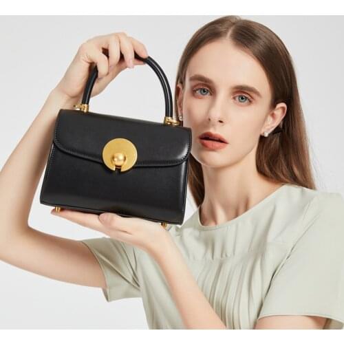 Fashion retro light and versatile one-shoulder messenger hand carrying hardware lock casual small square bag